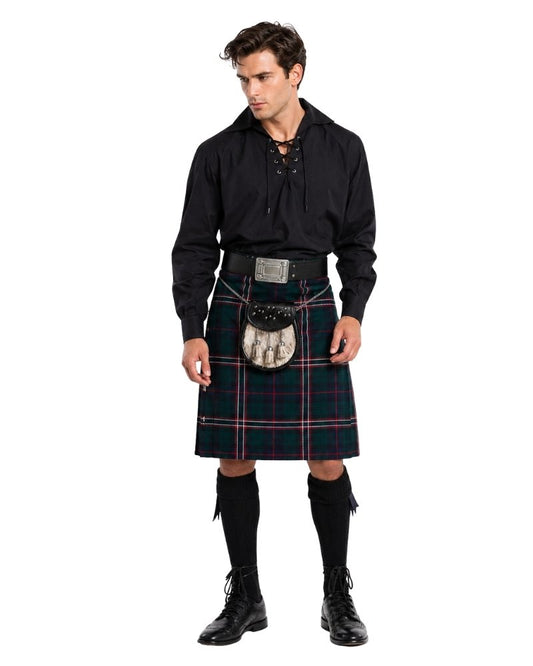 Man wearing a traditional Scottish kilt on a white background