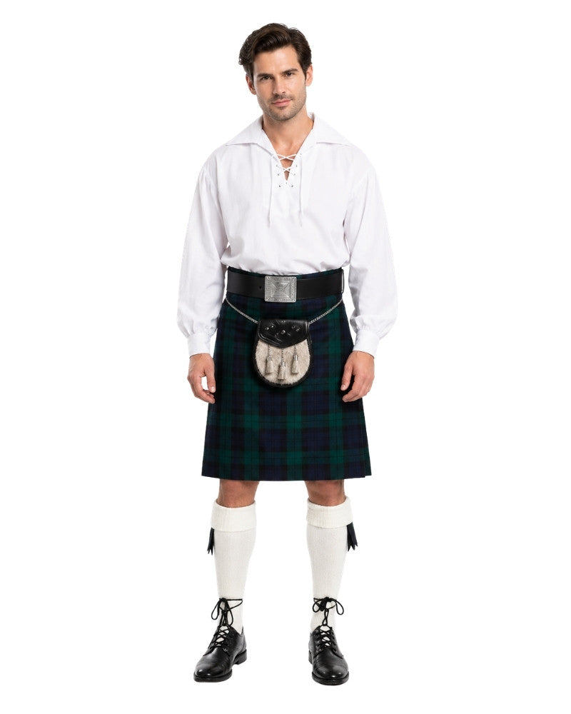 Man wearing a traditional Scottish kilt on a white background
