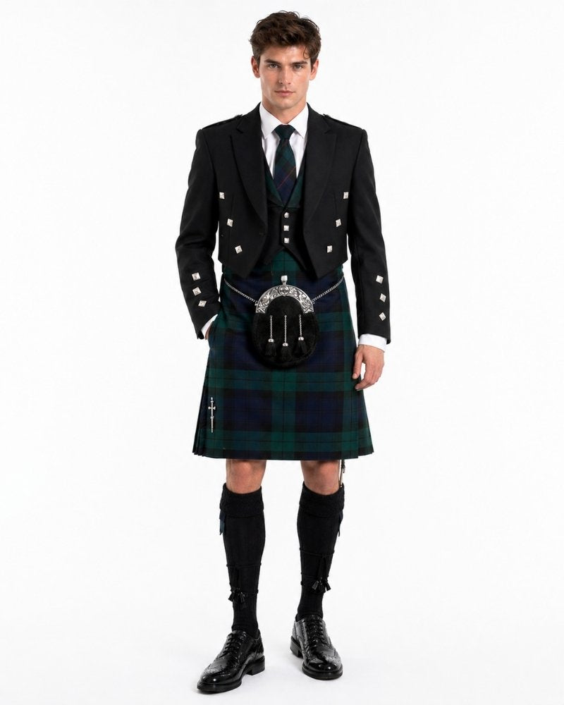 Man wearing a traditional Scottish kilt with a white background