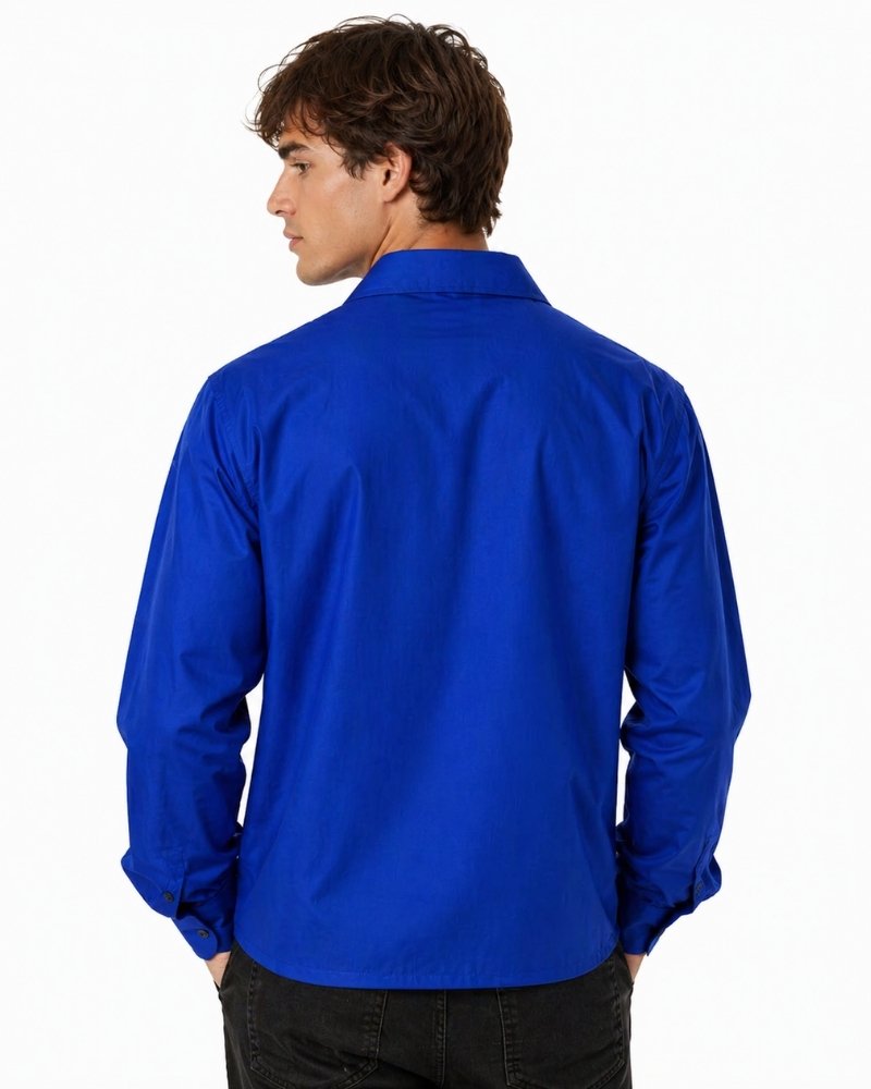 Man wearing a blue shirt on a white background