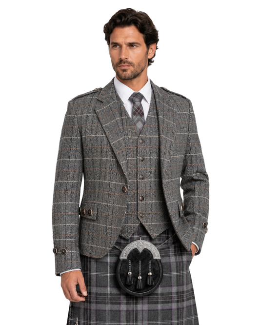 Man wearing a gray checkered suit with a kilt on a white background