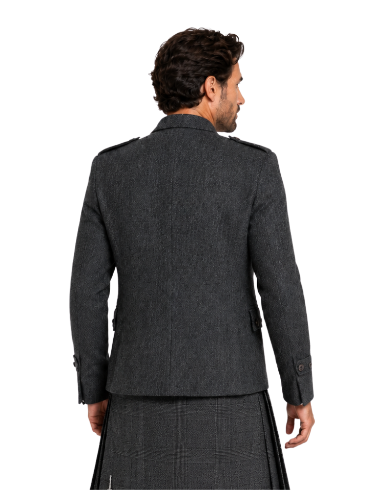 Man wearing a gray jacket and kilt from behind on a white background