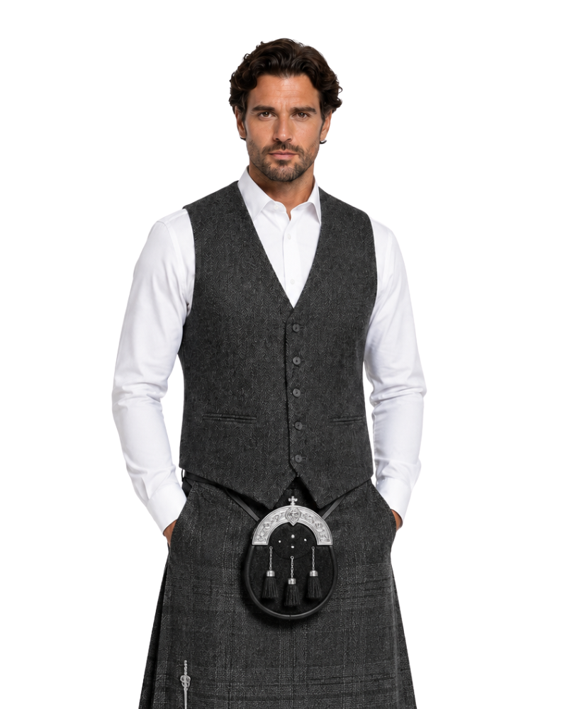 Man wearing a gray tweed kilt with a waistcoat on a white background