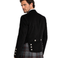Man wearing a black jacket and plaid kilt on a white background
