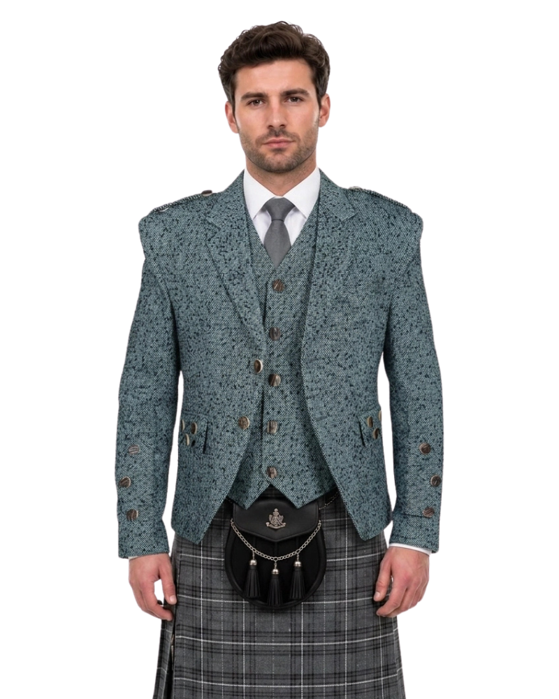 Man wearing a traditional Scottish kilt with a patterned jacket and vest on a white background