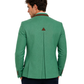 Green blazer with a triangle emblem worn by a person on a white background