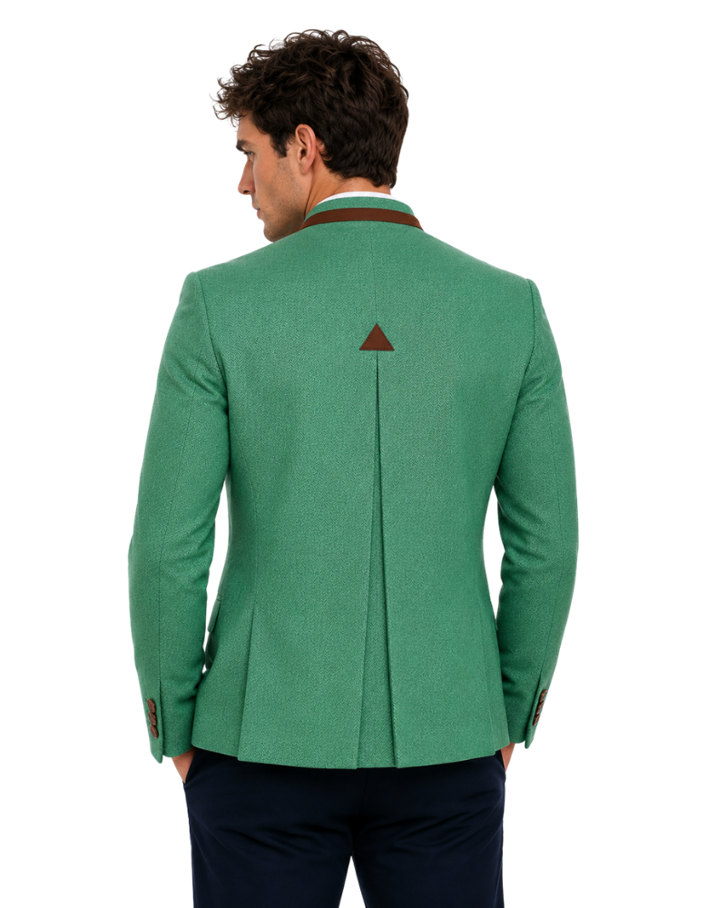 Green blazer with a triangle emblem worn by a person on a white background
