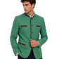 Man wearing a green jacket with brown accents on a white background