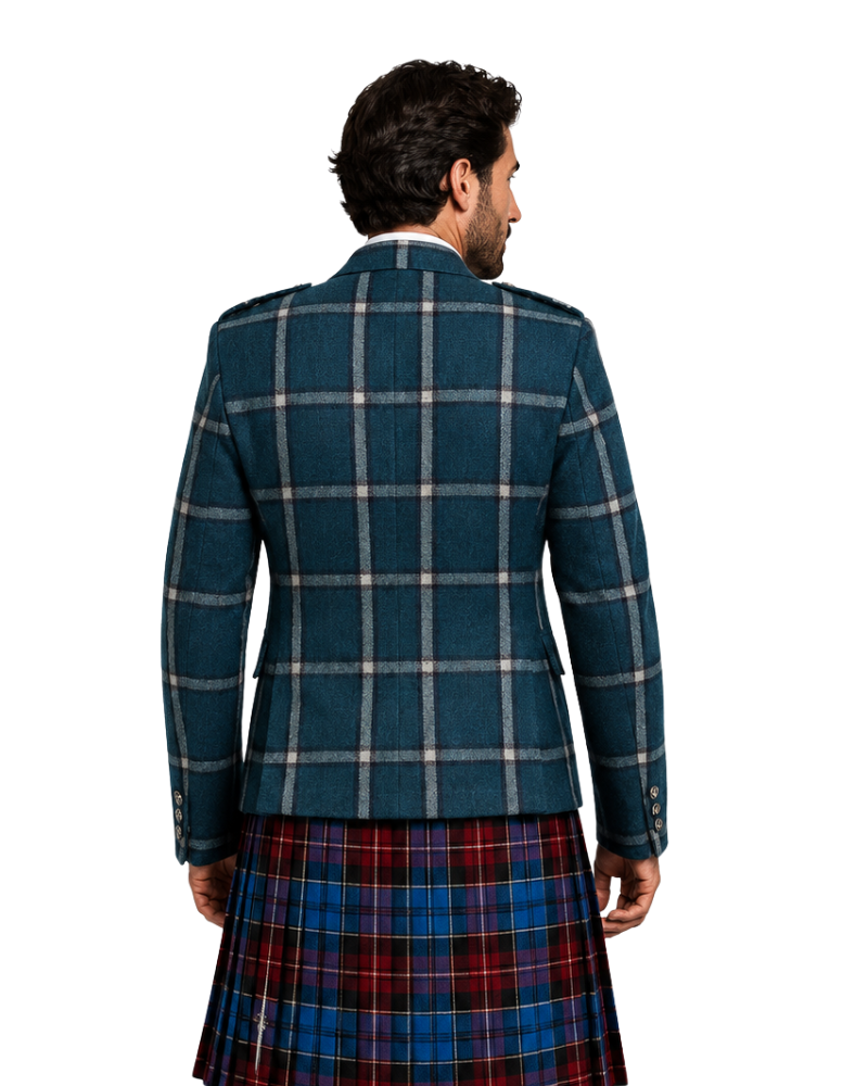 Man wearing a blue plaid jacket and red tartan kilt on a white background