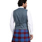 Man wearing a gray vest and red plaid kilt on a white background