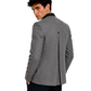 Man wearing a gray blazer on a white background