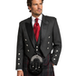 Man wearing a traditional Scottish kilt with a black jacket and red tie on a white background