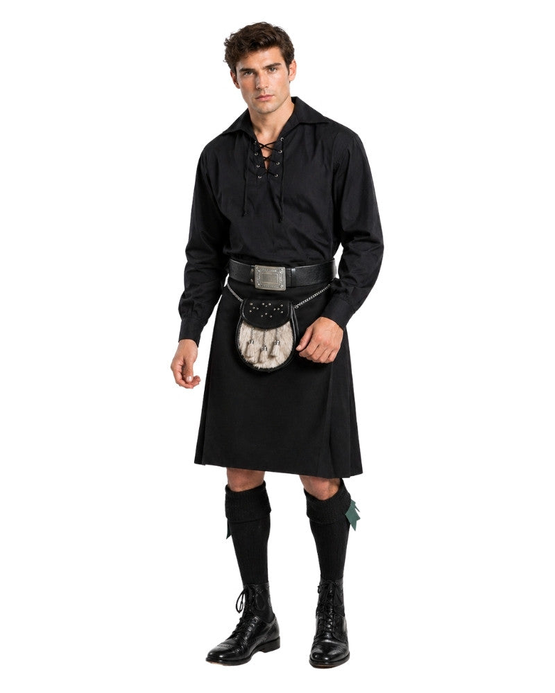 Man wearing a black kilt with a belt and boots on a white background