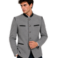 Man wearing a gray blazer with black accents on a white background