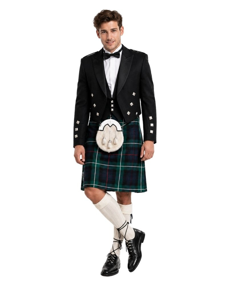 Man wearing a traditional Scottish kilt with a white background
