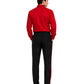 Man wearing a red shirt and black pants on a white background