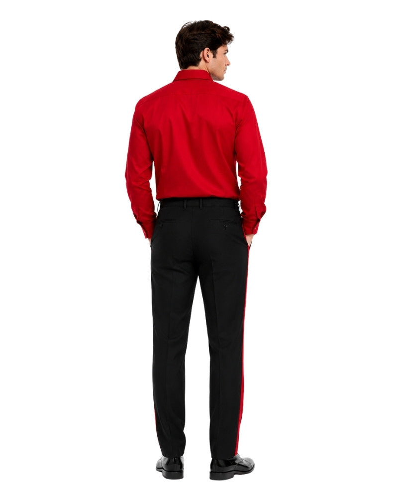 Man wearing a red shirt and black pants on a white background