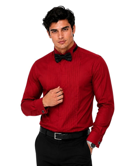 Man wearing a red dress shirt and black bow tie on a white background