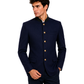 Man wearing a navy blue suit with gold buttons on a white background