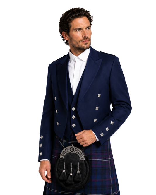 Man wearing a navy blue Highland outfit with a kilt on a white background