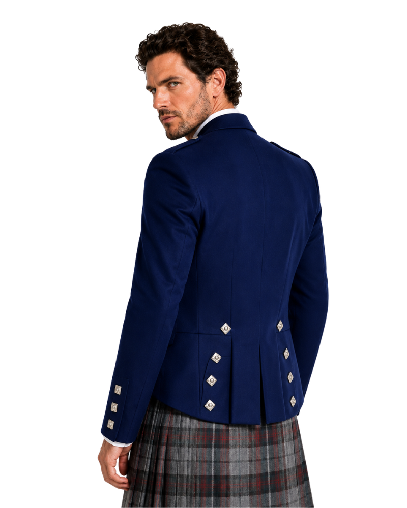 Man wearing a blue jacket and plaid kilt on a white background