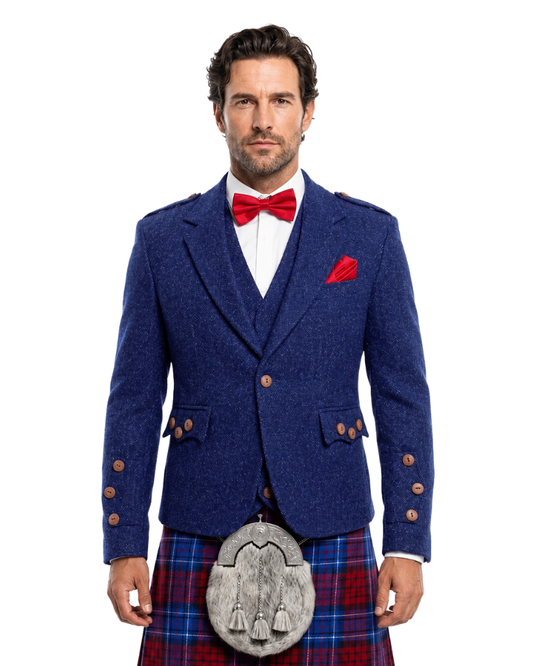 Man wearing a blue jacket, red bow tie, and plaid kilt on a white background