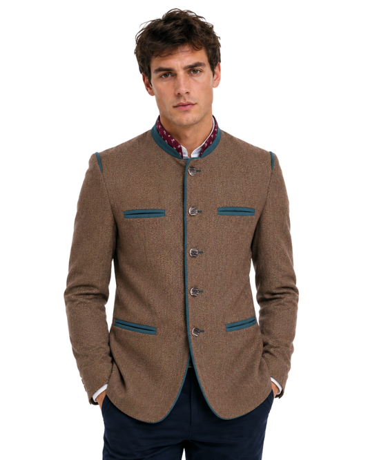 Man wearing a brown blazer with blue accents on a white background