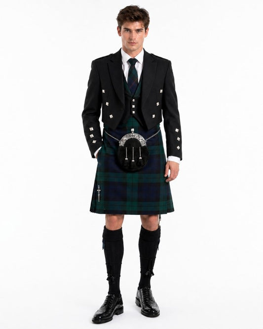 Man wearing a traditional Scottish kilt with a white background
