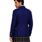man wearing a Royal Blue Argyle  jacket with grey and black plaid kilt against white background.