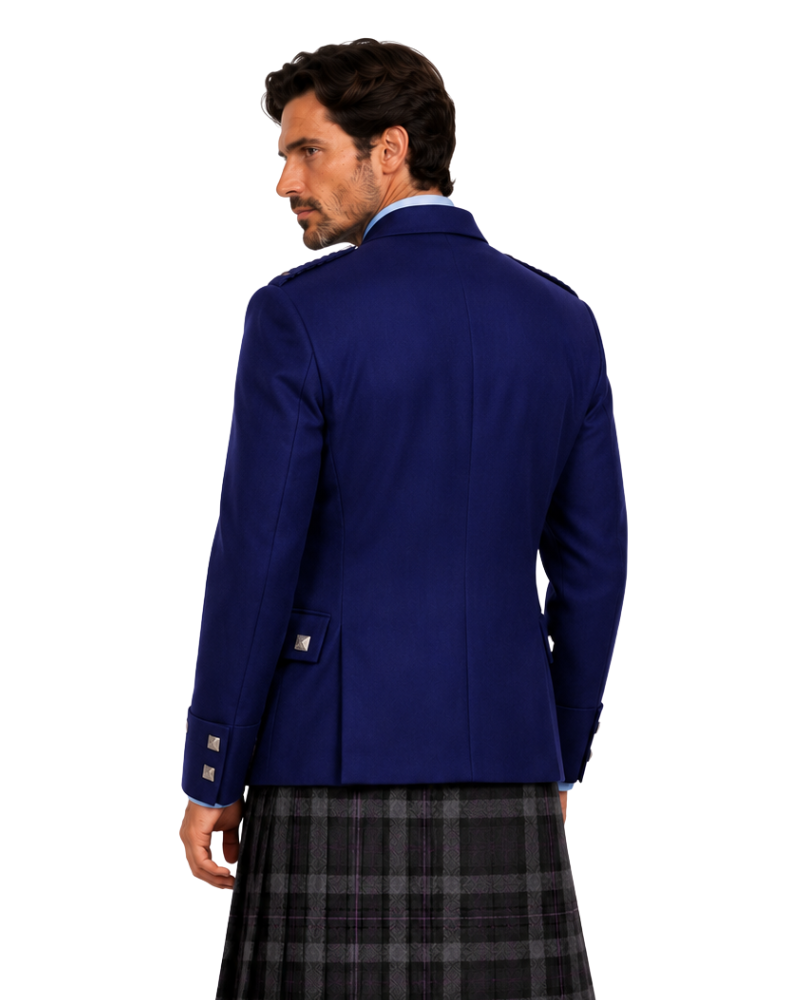man wearing a Royal Blue Argyle  jacket with grey and black plaid kilt against white background.