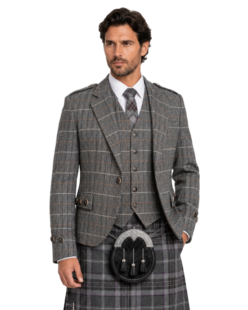 Man wearing a gray checkered suit with a kilt on a white background