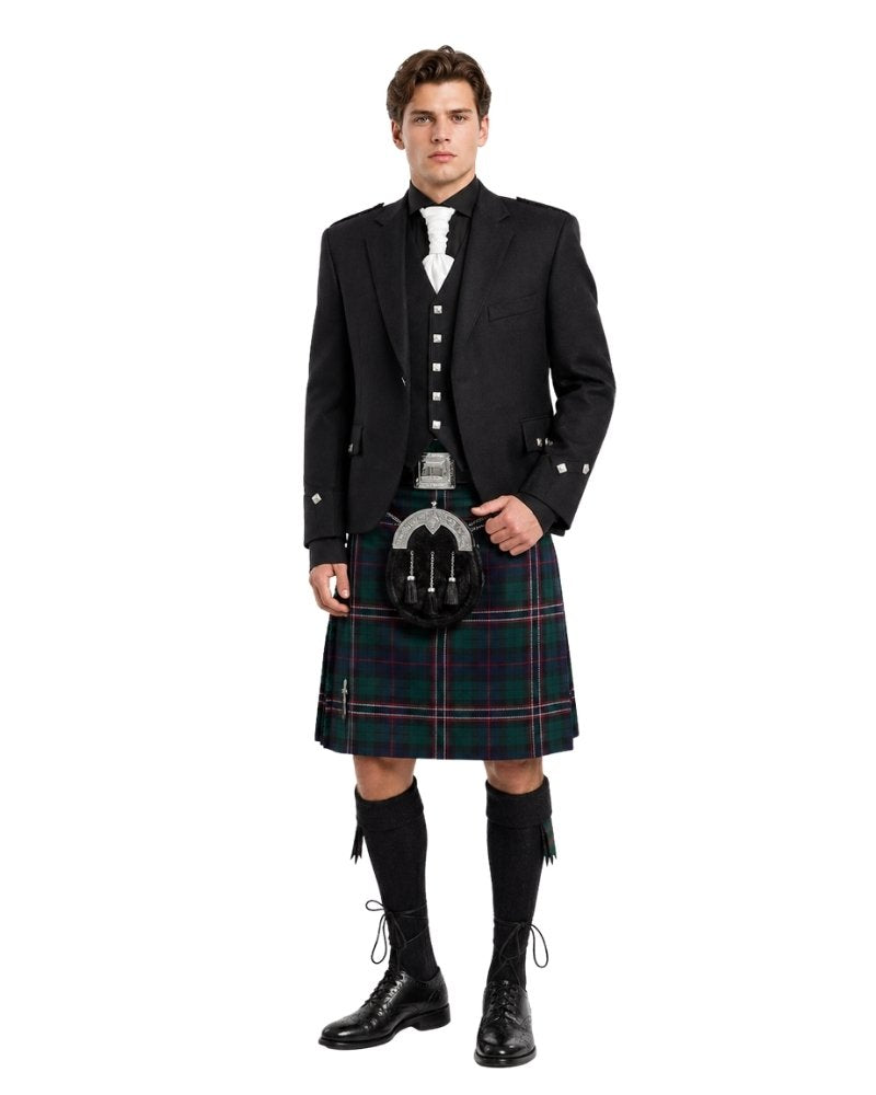 Man wearing a traditional Scottish kilt with a jacket and boots on a white background