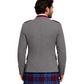 Person wearing a gray jacket and plaid kilt on a white background