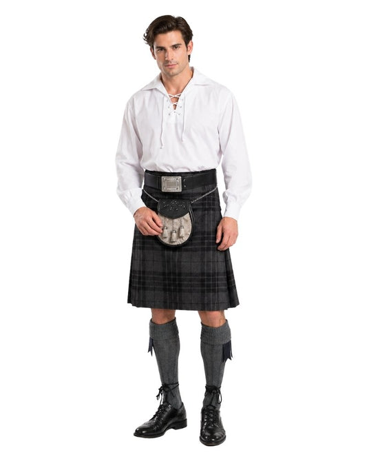Man wearing a black kilt with a white shirt on a white background